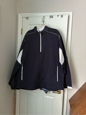 New with tags Men's Footjoy Navy and White half-Zip Sport Wind Shirt. New. XXXL
